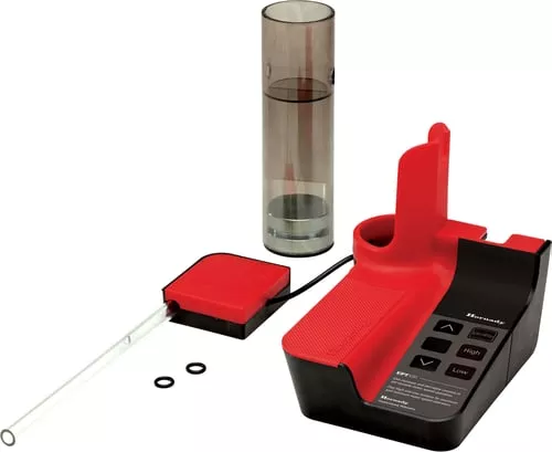 VIBRATORY TRICKLER
